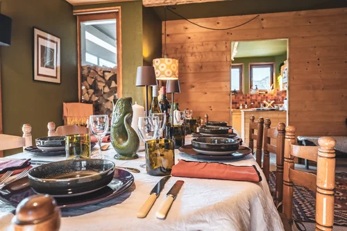Dinner laid out on the shared dining table at The Fat Fox Lodge