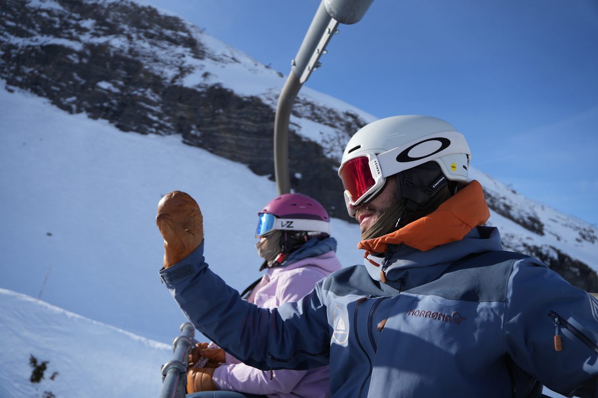 GAP students riding the chairlift on a bluebird day