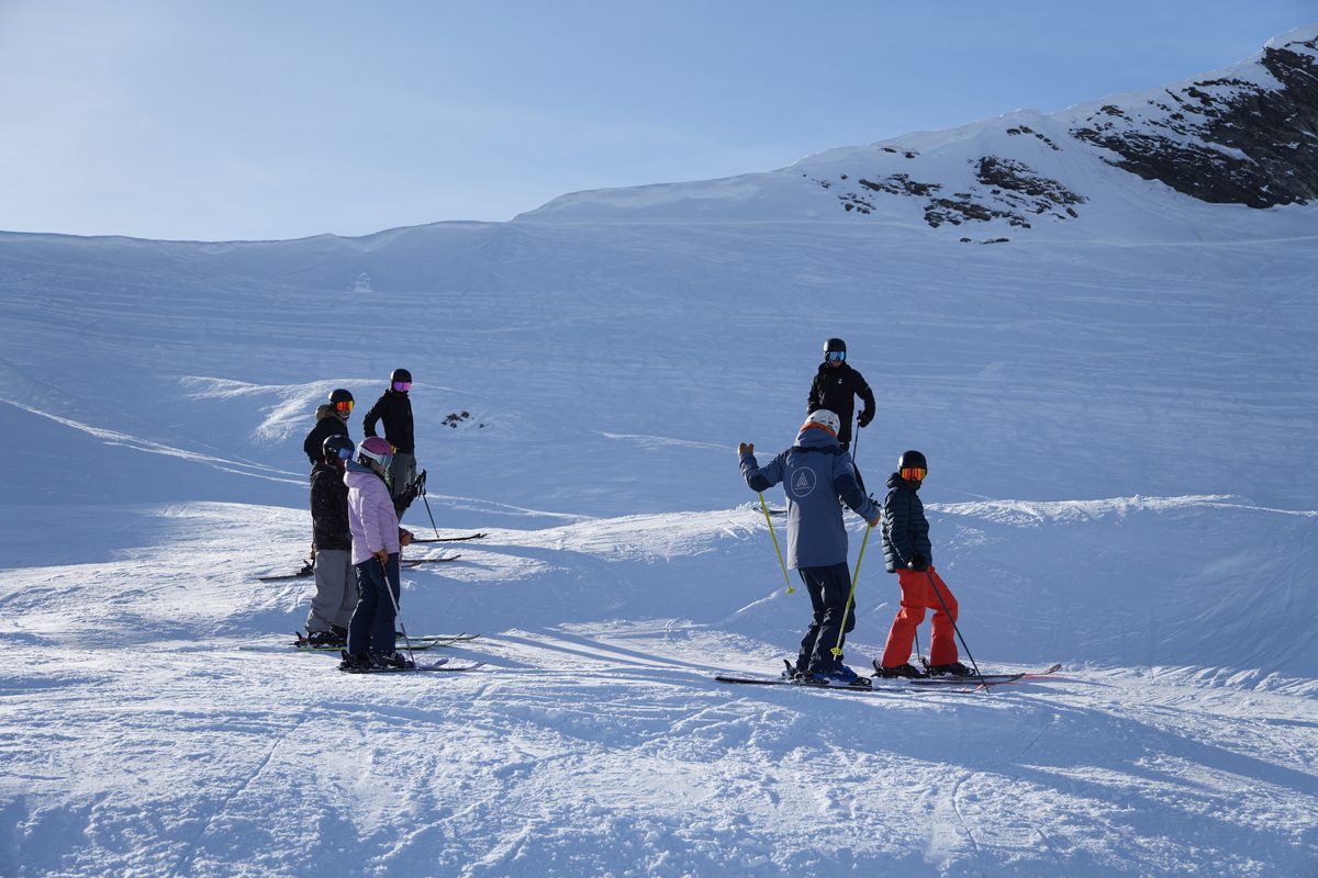 A coach running a training session with the group